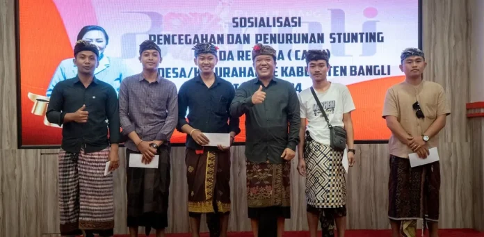Bupati Bangli, Sang Nyoman Sedana Arta menghadiri kegiatan Sosialisasi Pencegahan dan Penurunan Stunting yang ditujukan bagi calon pengantin