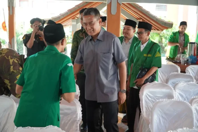 Wakil Bupati Buleleng, Gede Supriatna, menghadiri pelantikan Pengurus Pimpinan Anak Cabang (PAC) Gerakan Pemuda Ansor se-Kabupaten Buleleng